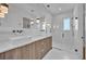 Modern bathroom with double sinks, marble vanity, and a large walk-in shower at 1917 S Lakemont Ave, Winter Park, FL 32792
