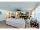 Open and airy living room with neutral decor, and a large sectional sofa at 25 Bahia Crse, Ocala, FL 34472