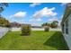 Spacious backyard with lush lawn and privacy fence at 25 Bahia Crse, Ocala, FL 34472