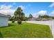 Large backyard with a privacy fence at 25 Bahia Crse, Ocala, FL 34472