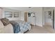 Spacious bedroom with carpeted floors and large windows at 2892 Waterlily Way, Poinciana, FL 34759
