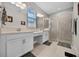 Double vanity bathroom with a large shower and plenty of counter space at 919 Braewood Dr, Clermont, FL 34715