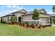 One-story home with attractive landscaping and a two-car garage at 919 Braewood Dr, Clermont, FL 34715