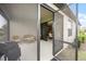 Screened patio with access from inside and backyard at 919 Braewood Dr, Clermont, FL 34715