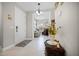 Open entryway with view into living room and access to the front door at 919 Braewood Dr, Clermont, FL 34715