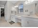 Double vanity bathroom with a large shower and plenty of counter space at 919 Braewood Dr, Clermont, FL 34715