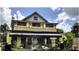 Two-story building with a unique facade at 195 Railroad Ave, Osteen, FL 32764
