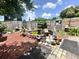 Charming courtyard with a fountain and various decorations at 195 Railroad Ave, Osteen, FL 32764