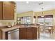 Kitchen with breakfast nook and view to backyard at 13530 Hawk Lake Dr, Orlando, FL 32837