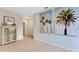 Light and airy hallway with stylish decor and light walls at 2888 Waterlily Way, Poinciana, FL 34759