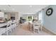 Open concept living and dining area with light and airy feel at 2888 Waterlily Way, Poinciana, FL 34759