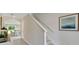Bright entryway with view into living and dining area at 2888 Waterlily Way, Poinciana, FL 34759