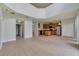 Kitchen with island, stainless steel appliances, and view into adjacent living area at 2839 Boating Blvd, Kissimmee, FL 34746