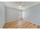 Spacious bedroom with hardwood floors and ceiling fan at 2839 Boating Blvd, Kissimmee, FL 34746