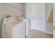 Laundry room with washer, dryer, and exterior access at 2839 Boating Blvd, Kissimmee, FL 34746