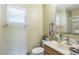 Clean bathroom with a vanity, toilet, and shower at 3090 Tioga Ter, Deltona, FL 32738
