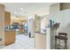 Kitchen boasts granite countertops and a breakfast bar at 3090 Tioga Ter, Deltona, FL 32738
