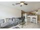 Spacious living room with a view into the kitchen and dining areas at 3090 Tioga Ter, Deltona, FL 32738