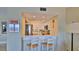 Updated kitchen with white cabinets and breakfast bar at 5207 S Atlantic Ave # 1226, New Smyrna Beach, FL 32169