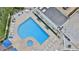 Relaxing community pool and hot tub with plenty of lounge chairs at 5207 S Atlantic Ave # 1226, New Smyrna Beach, FL 32169