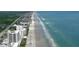 Aerial view of oceanfront high rise building with beach access at 5207 S Atlantic Ave # 1226, New Smyrna Beach, FL 32169
