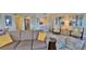 Bright living room with comfy seating and ocean view at 5207 S Atlantic Ave # 1226, New Smyrna Beach, FL 32169