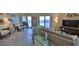 Spacious living room with ocean view and comfortable seating at 5207 S Atlantic Ave # 1226, New Smyrna Beach, FL 32169