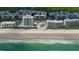 Aerial view of beachfront high rise building with pool and beach access at 5207 S Atlantic Ave # 1226, New Smyrna Beach, FL 32169
