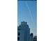 Aerial view showing coastal community with rocket launch in background at 5207 S Atlantic Ave # 1226, New Smyrna Beach, FL 32169