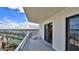 Spacious balcony with lounge chair, offering ocean and city views at 5207 S Atlantic Ave # 1226, New Smyrna Beach, FL 32169