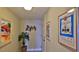 Entryway with coastal artwork and decor at 5207 S Atlantic Ave # 1226, New Smyrna Beach, FL 32169