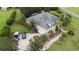 House and driveway from above, showing the property size and landscaping at 25013 Derby Dr, Sorrento, FL 32776