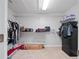 Large walk-in closet with ample shelving and hanging space at 25013 Derby Dr, Sorrento, FL 32776
