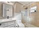 Modern bathroom with a walk-in shower and updated vanity at 1616 E Marks St, Orlando, FL 32803