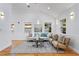 Spacious living area featuring hardwood floors and abundant natural light at 1616 E Marks St, Orlando, FL 32803