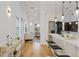 Open concept kitchen with breakfast bar and view into living area at 1616 E Marks St, Orlando, FL 32803