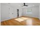 Spacious bedroom featuring hardwood floors and a large window at 1616 E Marks St, Orlando, FL 32803