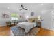 Relaxing bedroom with hardwood floors and a sitting area at 1616 E Marks St, Orlando, FL 32803