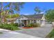 Charming craftsman home with a landscaped front yard and paver driveway at 1616 E Marks St, Orlando, FL 32803