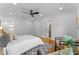 Light and airy bedroom with hardwood floors and ensuite bathroom at 1616 E Marks St, Orlando, FL 32803