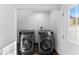 Laundry room with modern washer and dryer in a bright space at 1616 E Marks St, Orlando, FL 32803
