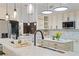 Modern kitchen featuring a large island, stainless steel appliances, and ample counter space at 1616 E Marks St, Orlando, FL 32803