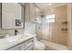Clean bathroom with gray vanity, white countertop and a glass shower at 1616 E Marks St, Orlando, FL 32803