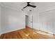 Light and airy bedroom with hardwood floors and ample closet space at 1616 E Marks St, Orlando, FL 32803