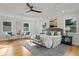 Primary bedroom with hardwood floors and multiple windows at 1616 E Marks St, Orlando, FL 32803