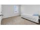 Small bedroom with single bed and window at 821 Sun Burst Rd, Winter Haven, FL 33880