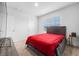 Bedroom with double bed, window with blinds, and closet at 821 Sun Burst Rd, Winter Haven, FL 33880