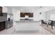 Kitchen boasts granite countertops and stainless steel appliances at 821 Sun Burst Rd, Winter Haven, FL 33880