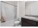 Clean bathroom with tub shower, toilet, and vanity at 821 Sun Burst Rd, Winter Haven, FL 33880