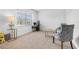 Spacious home office with window and two gray chairs at 821 Sun Burst Rd, Winter Haven, FL 33880